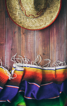 Cinco: Sombrero And Blanket Wooden Table Background