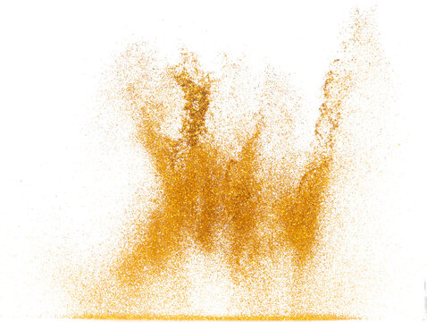 Explosion metallic gold glitter sparkle bokeh isolated white background decoration. Golden Glitter powder spark blink celebrate, blur foil part explode in air, fly throw gold glitters particle shape