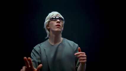 Amazed vr gamer playing metaverse simulation closeup. Futuristic man exploring