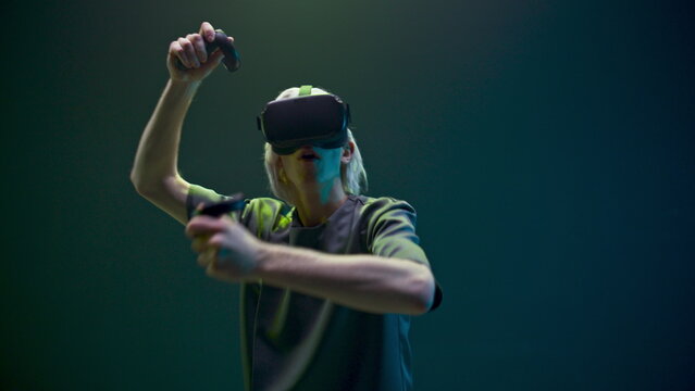 Youngster man practicing exercising using VR headset. Network experience concept