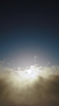 The concept of redemption. Rolling the camera down from the clouds to a general view of the Cross on Calvary Hill with fast moving beautiful clouds in the blue sky. Resurrection, Easter.  Vertical