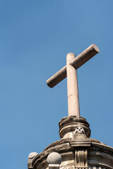 Atrial cross with aztec skulls in its base of the metropolitan cathedral in Mexico City downtown.