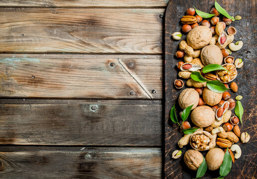 Nuts background. Different Range of natural nuts .
