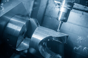 The 5-axis machining center cutting the automotive parts by special tool.