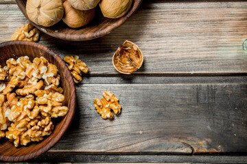 Shelled walnuts in a bowl.