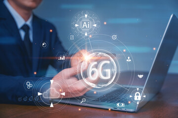 Businessman touching smartphone with network hologram 6G. The concept of 6G network. data high-speed. Internet of Things, internet and global connection, Network internet mobile wireless business