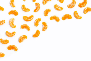 Fototapeta premium Orange segments on white background.