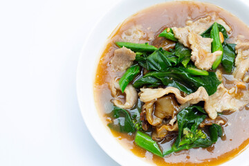 Fried flat noodle with pork and kale in gravy sauce