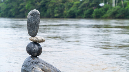 Balance of stones in the river, meditation and natural art