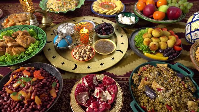 Ramadan mubarak, holiday table. Festive traditional Middle Eastern Muslim Halal foods. Celebration of Eid al-Fitr