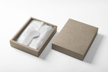 Sticker with cardboard box packaging mockup template with copy space for your logo or graphic...