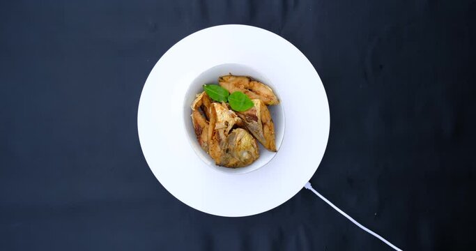 Fried fish pieces recorded in flat rotating mode