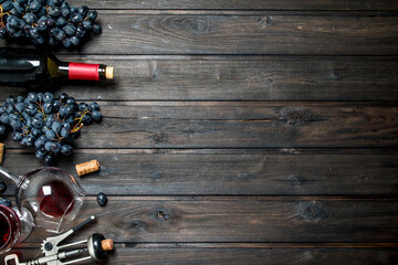 Wine background. Red wine with corkscrew.