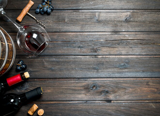 Wine background. Red wine with grapes.