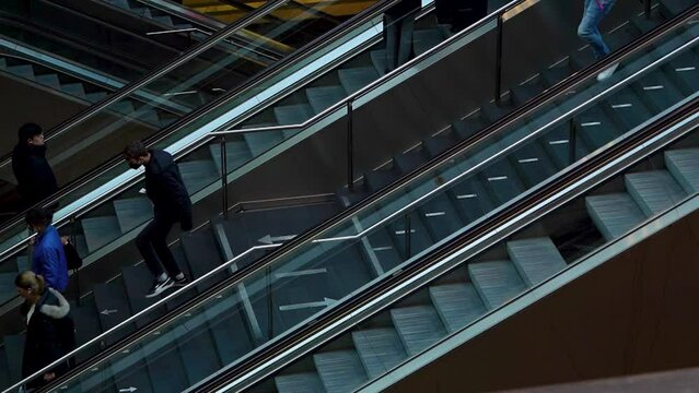 Time lapse of travelers using escalator and normal stairs. in 4k