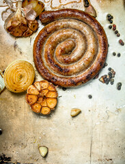Fried sausages with garlic and onions.