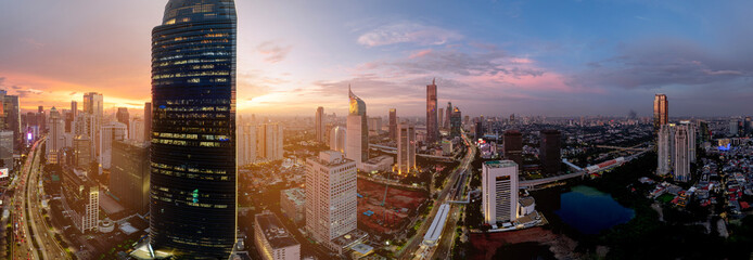 Fototapeta premium Jakarta Panoramic from Sudirman street view during the golden hour. Jakarta is capital city of indonesia before it be moved to Kalimantan.