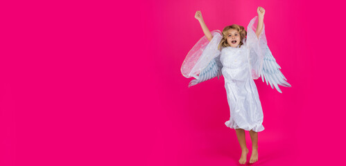 Excited angel child jump, kids jumping, full body in movement. Banner header with copy space.