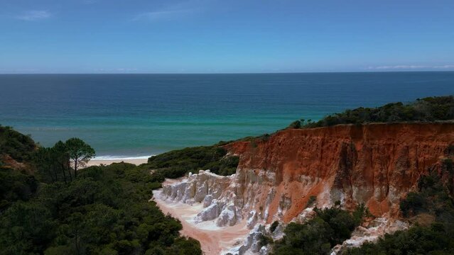 Scenic Pinnacles at Beowa and Ben Boyd National Park, New South Wales, Australia, near Sydney. Drone aerial view of seaside sandy beach sea and red rocks in 4K. Tourist attraction nature documentary