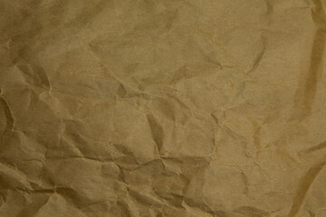 Brown wrinkle paper background texture. Brown template. Brown paper background.