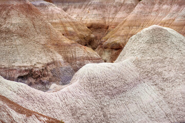 Striped purple sandstone formations of Blue Mesa badlands in Petrified Forest National Park, Arizona, USA.