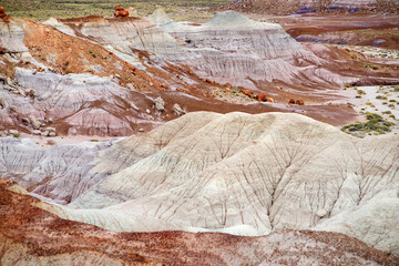 Striped purple sandstone formations of Blue Mesa badlands in Petrified Forest National Park, Arizona, USA.