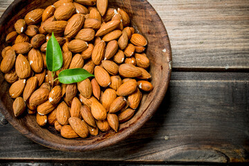 Almonds in bowl .