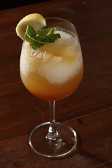 Cocktail with lemon, mint and crushed ice