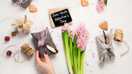 Valentine's Day Zero Waste Concept. Eco-friendly linen packaging as a gift for Valentine's Day in...