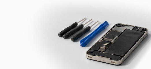 Technician repairing the Cell phone parts and tools for recovery repair phone smartphone and...