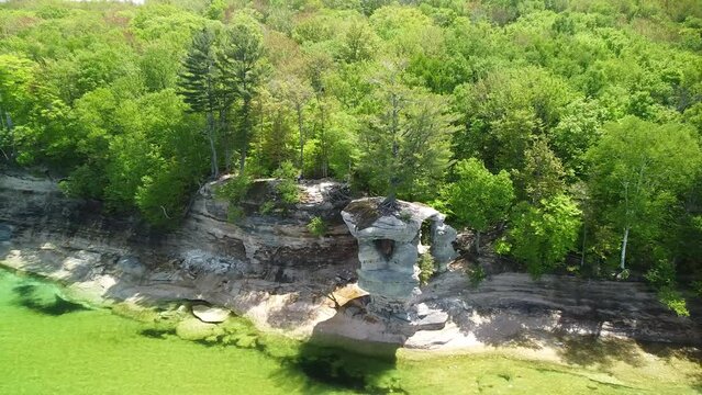 Aerial Ascent of Coastal Sandstone Rock Formations, Chapel Rock, Pictured Rocks National Lakeshore