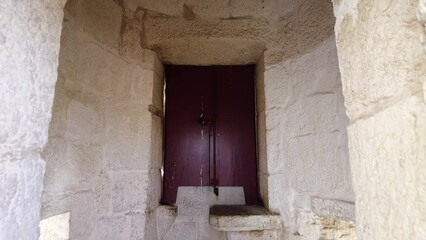 Closed Window With Aged Stone Walls Inside The Belem Tower In Lisbon, Portugal. Tilt-down, Pullback