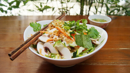 Salad with mushrooms and vegetables. Traditional Asian salad recipe.