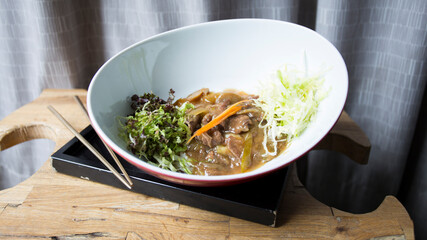 Spicy beef meat salad with vegetables. Traditional asian recipe.