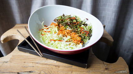 Spicy chicken meat salad with vegetables. Traditional asian recipe.
