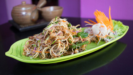 Noodle salad with bean sprouts and vegetables. Traditional asian recipe.