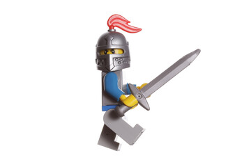 Naklejka premium Russia Vyborg 01.14.2023 Lego figurine of a medieval knight in armor with a sword in his hand isolated on a white background