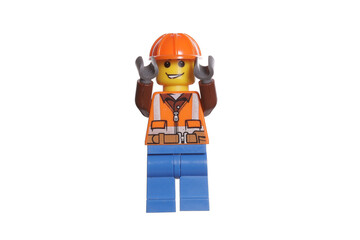 Naklejka premium Russia Vyborg 01.14.2023 Lego worker in helmet isolated on white background
