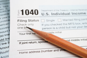 Tax form 1040 U.S. Individual Income Tax Return, business finance concept.