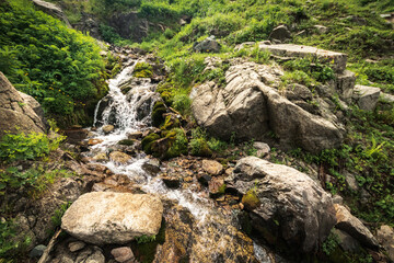 Picturesque nature in the vicinity of Almaty - Qimasar Waterfall in the Kimasar Gorge. Tourist natural places of Kazakhstan.