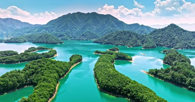 Aerial footage of Thousand Island Lake natural scenery in Hangzhou, Zhejiang Province, China. Green mountain and lake nature landscape in summer.