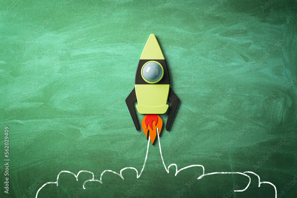 Aufkleber startup and business concept with taking off bright graphic rocket on green chalkboard background. 3