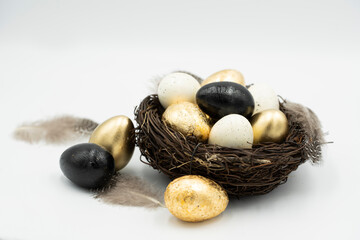 Nest, Easter golden and white eggs