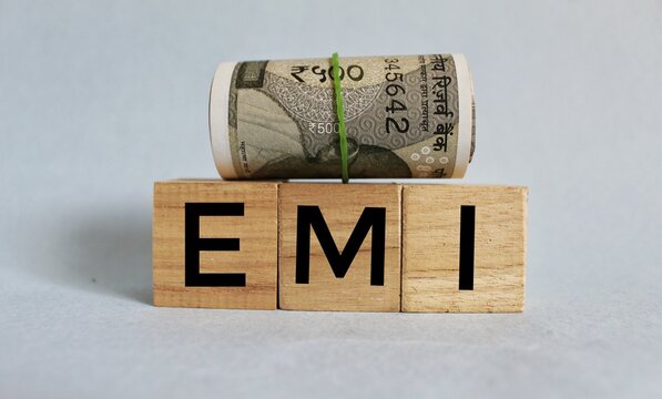 EMI Equated Monthly Installment - fixed payment amount made by a borrower to a lender at a specified date each calendar month, acronym text concept background