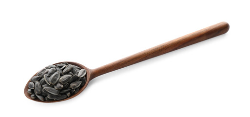 Sunflower seeds in wooden spoon isolated on white