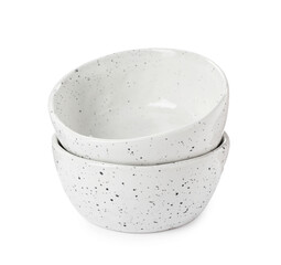 Beautiful empty ceramic bowls on white background
