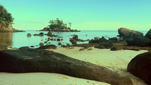 Mahe Seychelles cinematic time lapse on the beach with people snorkelling