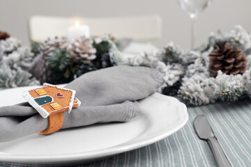 Festive place setting with beautiful dishware and decor for Christmas dinner, closeup