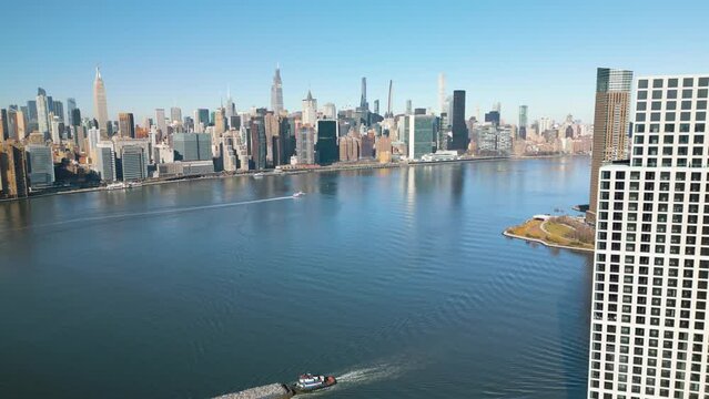 Amazing Aerial View of Manhattan from Brooklyn, with East River in Foreground.