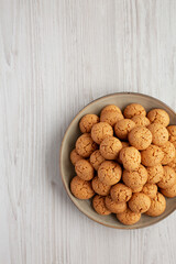 Homemade Italian Amaretti Cookie Biscuits on a Plate, top view. From above, overhead, flat lay. Copy space.